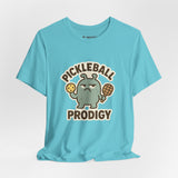 Pickleball Prodigy – Funny Pickleball Monster T-Shirt, Quirky Sports Cartoon Graphic Tee