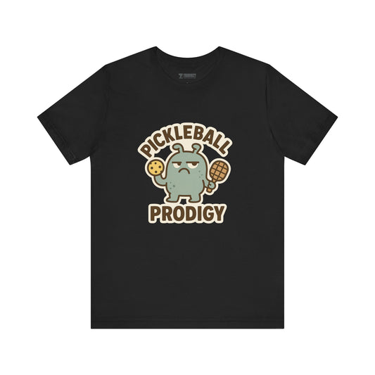Pickleball Prodigy – Funny Pickleball Monster T-Shirt, Quirky Sports Cartoon Graphic Tee