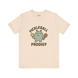 Pickleball Prodigy – Funny Pickleball Monster T-Shirt, Quirky Sports Cartoon Graphic Tee